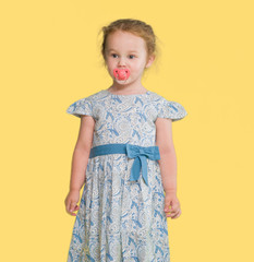 Beautiful blonde toddler gesturing