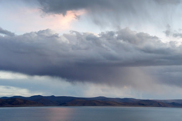 Western Tibet. Sacred lake Dangra (Dang Ra Gyu Tso) in summer in cloudy weather at twilight
