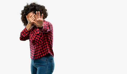 Beautiful arab woman stressful and shy keeping hand on head, tired and frustrated