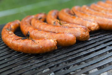fresh sausage on a grill