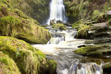 Fototapeta na wymiar Dramatic view of Waterfall in Wales, Pistyll Rhaeadr. Its highest waterfall of the United Kingdom