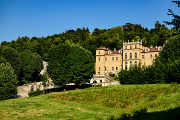 Fototapeta na wymiar Imposing palace in Villa della Regina surrounded by vegetation in a wonderful environment. Photograph taken in Turin, Italy.