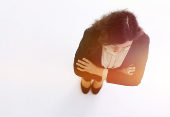 Businesswoman. Full length portrait top angle view isolated on w