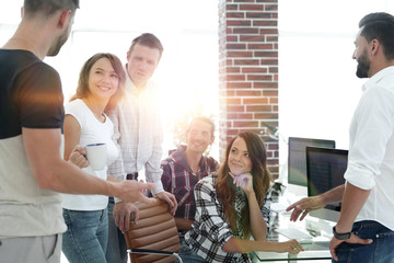 team of young employees discussing