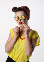 beautiful girl close her eyes with lollypop