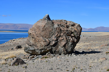 Natural geoglyph - mythical creature like the Sphinx on the shores of the sacred Tibetan lake Teri...