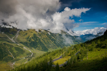 Landscape of the Alps. Snow-capped mountain peaks. beautiful meadows of Austria. Freedom, tourism, travel. Großglockner alpine  road. 
