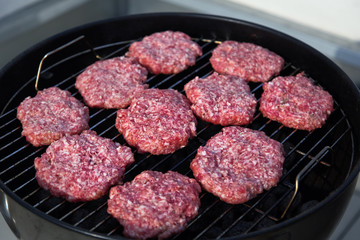 Homemade Hamburgers.Grill Meatballs. Raw Beef Meatballs. Outdoor Picnic.
