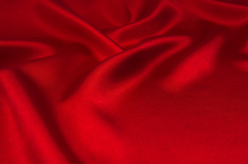 Obraz premium red satin or silk fabric as background