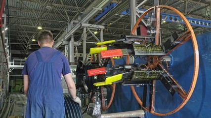 Roll threading coil pipe. Manufacture of plastic water pipes to the factory. Process of making...