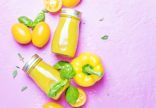 Yellow Vegetable Vegan Juice On Pink Background, Top View