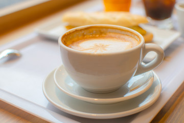 White coffee cup in coffee shop