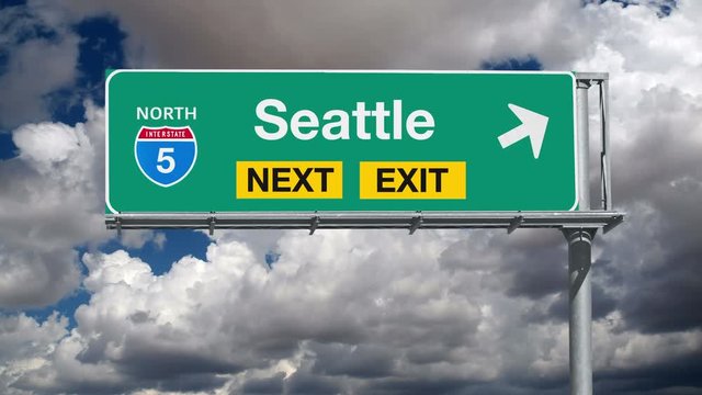 Seattle, Washington Interstate 5 Freeway Sign with Time Lapse Clouds