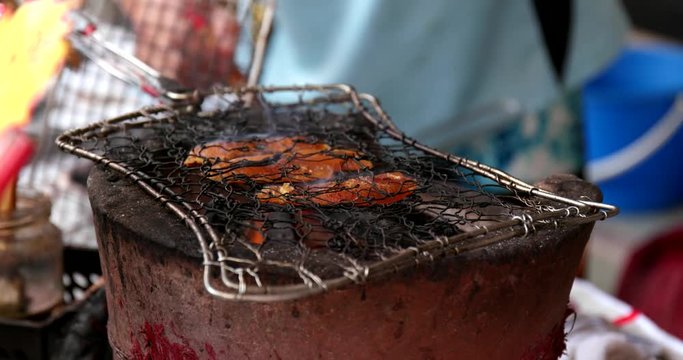 Street store selling grilled salting mullet roe