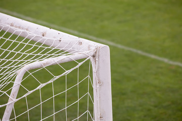 Close up of soccer (football) goal with soccer field