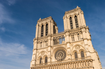 Fototapeta na wymiar Notre-Dame cathedral over blue sky