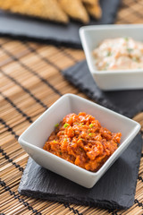 Tuna cereamy tartare with toast breads on slate board