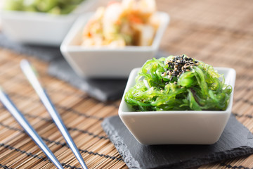 Wakame salad with seaweed and sesame seeds. © weyo