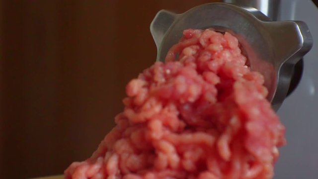 electric meat grinder prepares minced meat