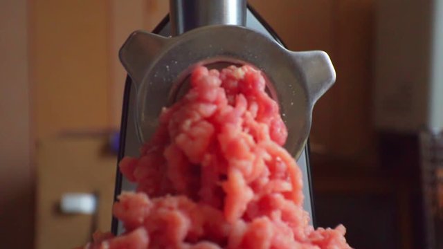 electric meat grinder prepares minced meat