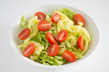 Dish with vegetable salad, tomato
