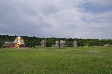 old wooden mill in the field