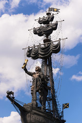 Monument to Peter I against the cloudy blue sky in Moscow