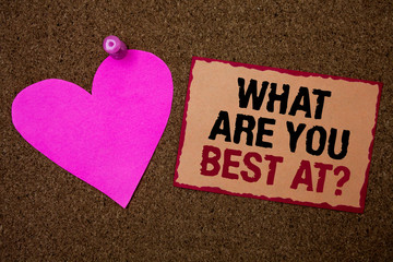 Conceptual hand writing showing What Are You Best At Question. Business photo showcasing Individual creativity is a unique capability Brown rug Ideas message pink heart love feelings thoughts.