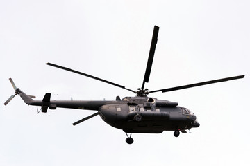 Helicopter military air force years against the gray sky