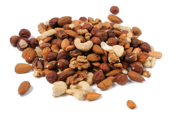 Mix of nuts on white background. Front view.