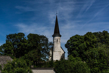 Fototapeta na wymiar View to ancient church of John the Baptist in Luganuse, Estonia. The church is built in 14th century.