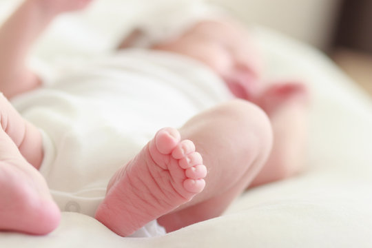 Feet of the newborn baby