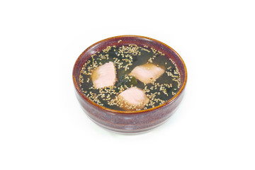 soup with seafood on a white background