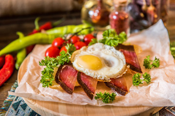 Fototapeta na wymiar bacon,egg,ham for breakfast in plate