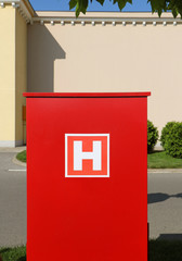 Red hydrant box on street