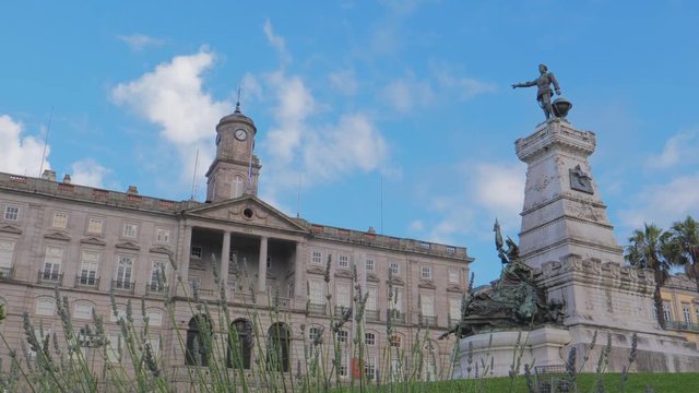 Palacio da Bolsa and statue of Infante Dom Henrique in Porto, Portugal.
