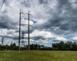 Fototapeta na wymiar Power line towers and wires. Sunny day.