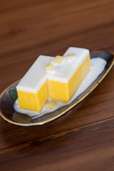 Traditional Indonesian cake served with cocnut milk