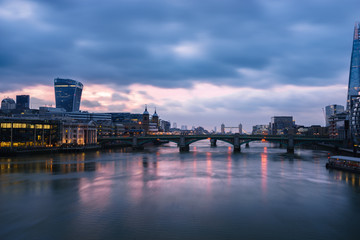 London bridge and financial district at dawn. England