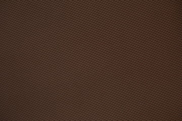 Fototapeta premium background texture. brown knit fabric on a white background