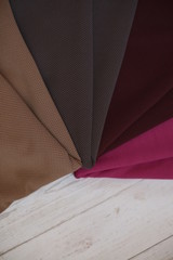 Fototapeta na wymiar background texture. brown, gray, pink knit fabric