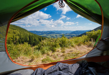 View from inside a tent on a beautiful mauntain landscape. Carpathian mountains, Ukraine