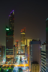 Aerial view of Abu Dhabi downtown at night, UAE