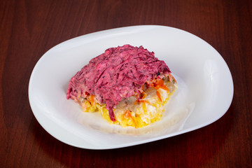 Russian salad with herring and beetroot