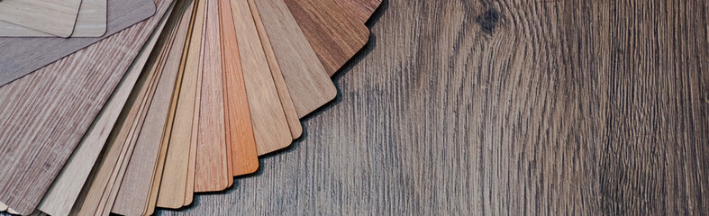 Obraz na płótnie Canvas Wooden samples for floor laminate or furniture in home or commercial building.Small color sample boards. Copy space, design