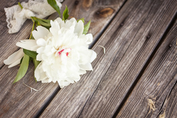 Bunch, bouquet of white  peonies on a wooden background. Frame of flowers. Colorful background © Valentina Rychkova