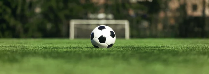 Crédence de cuisine en verre imprimé Foot Ballon sur le terrain de football