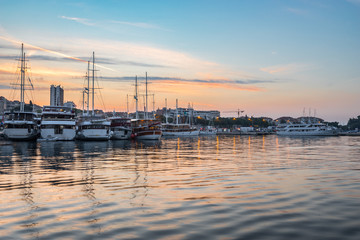 Harbor in Split, Croatia with yachts at sunrise