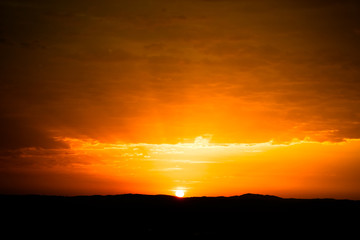 Fototapeta na wymiar orange colored sky at sunrise