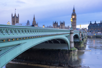 Close view of Westminster bridge and Big Ben in the background in London, England
